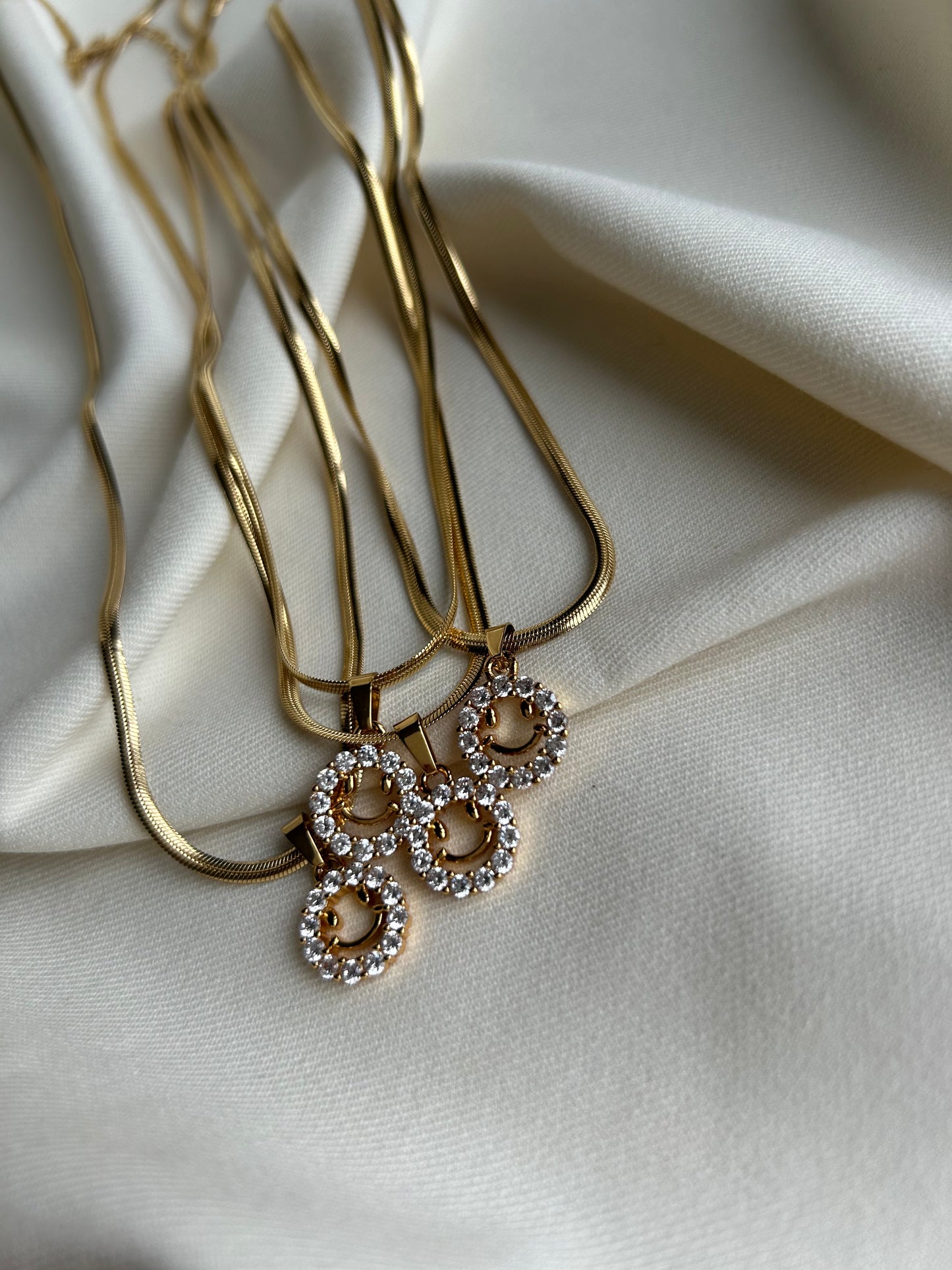 Lora smile ketting goud