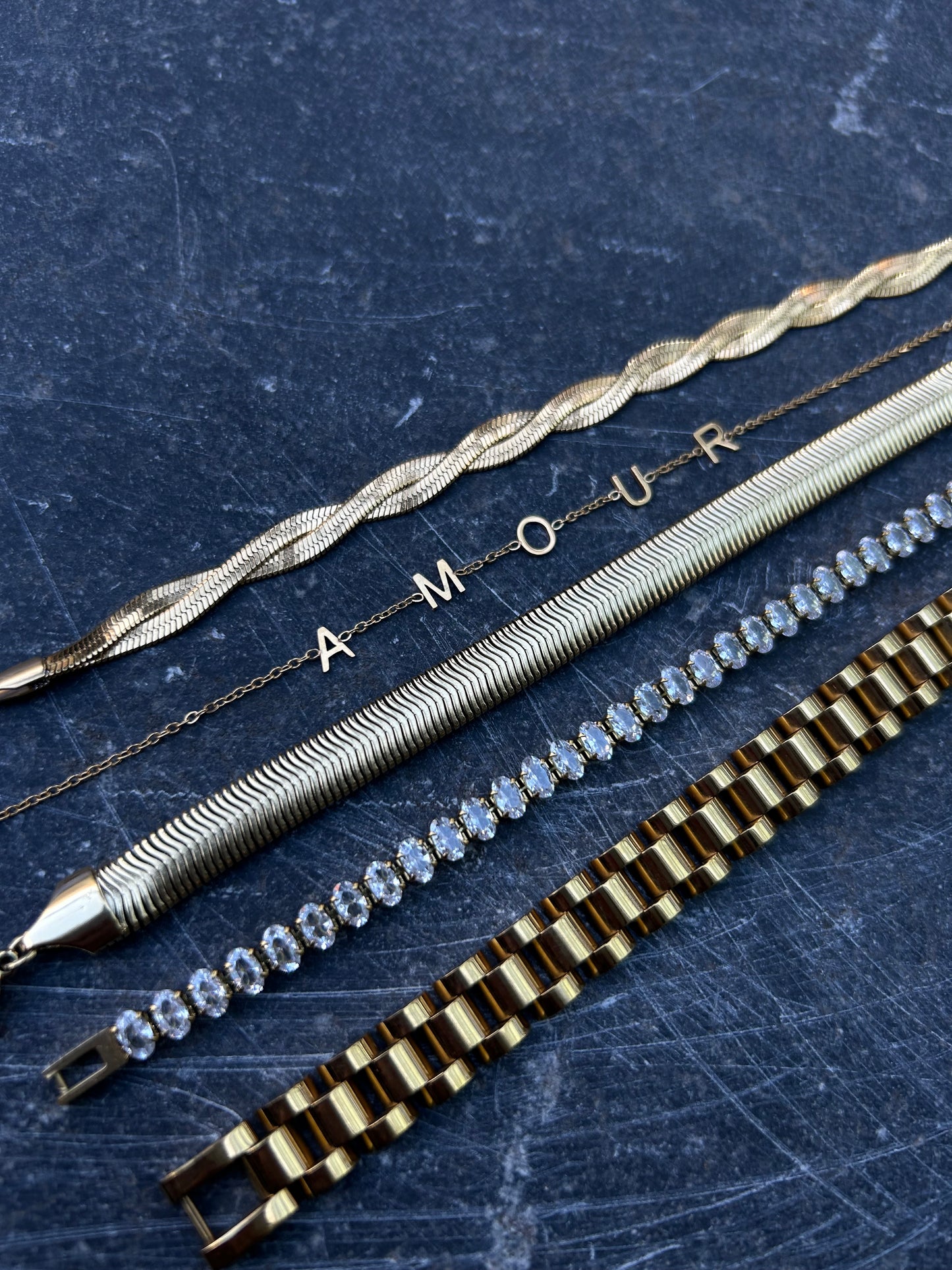 Romy gevlochten armband goud