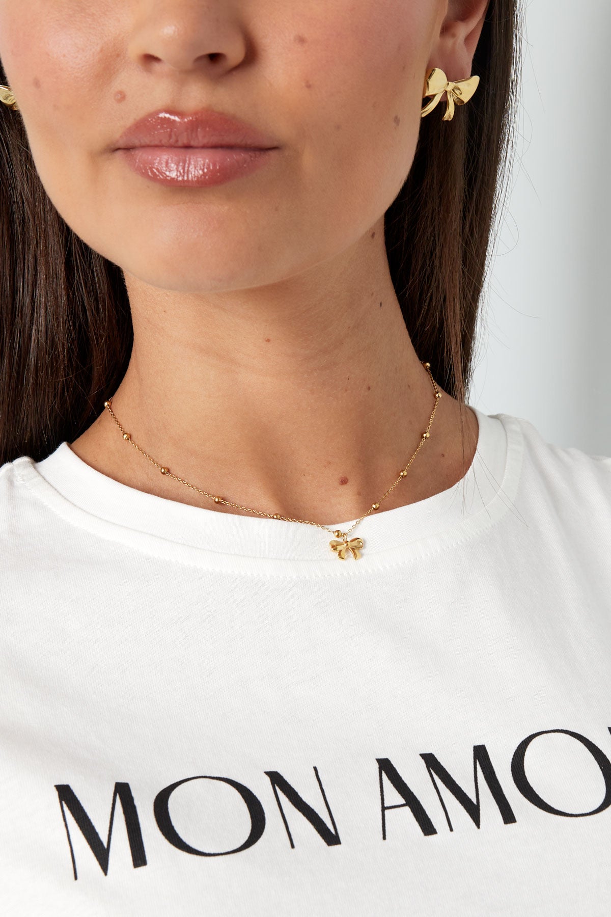 Bedel strikje ketting goud