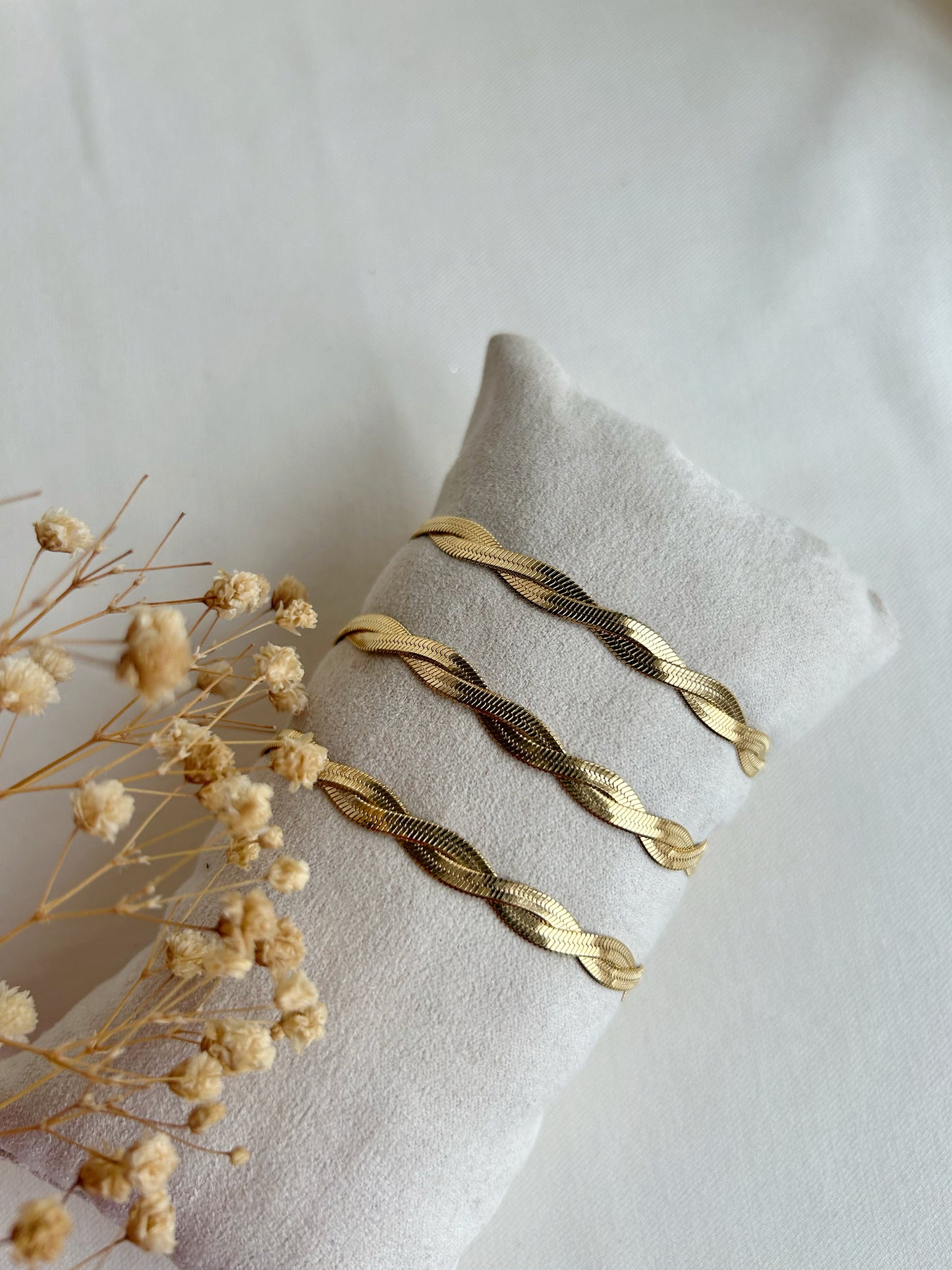 Romy gevlochten armband goud