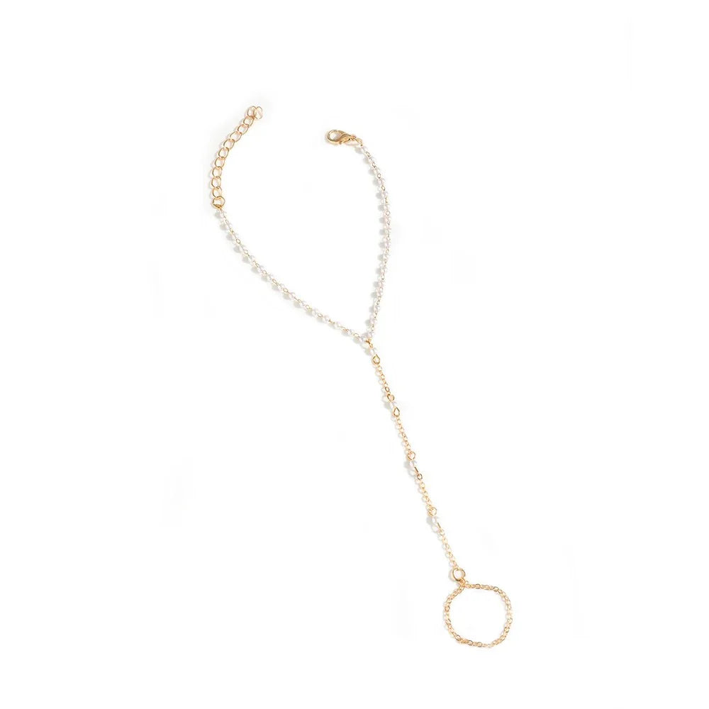 Mila hand chain goud/parel