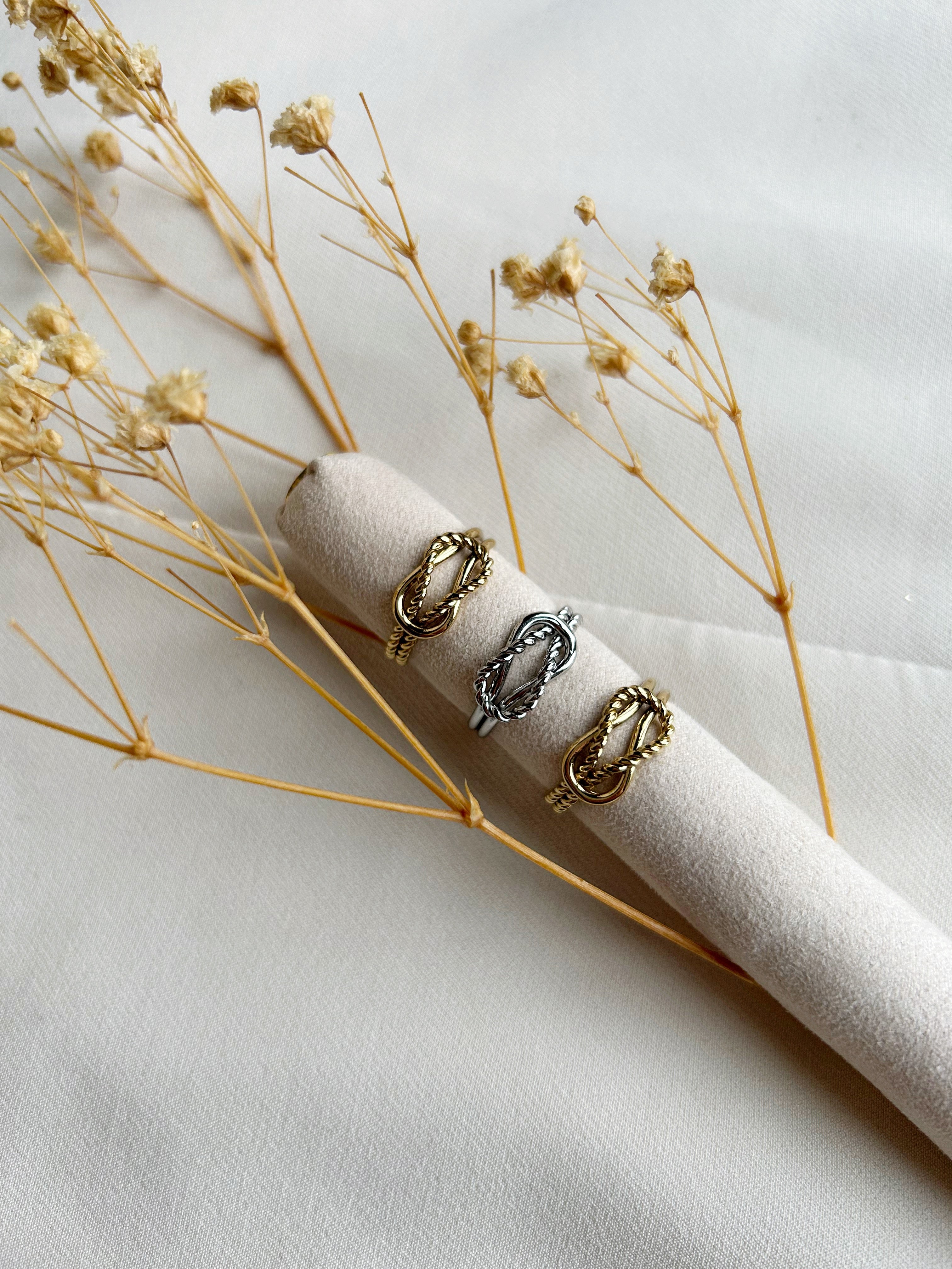 Gevlochten ring goud