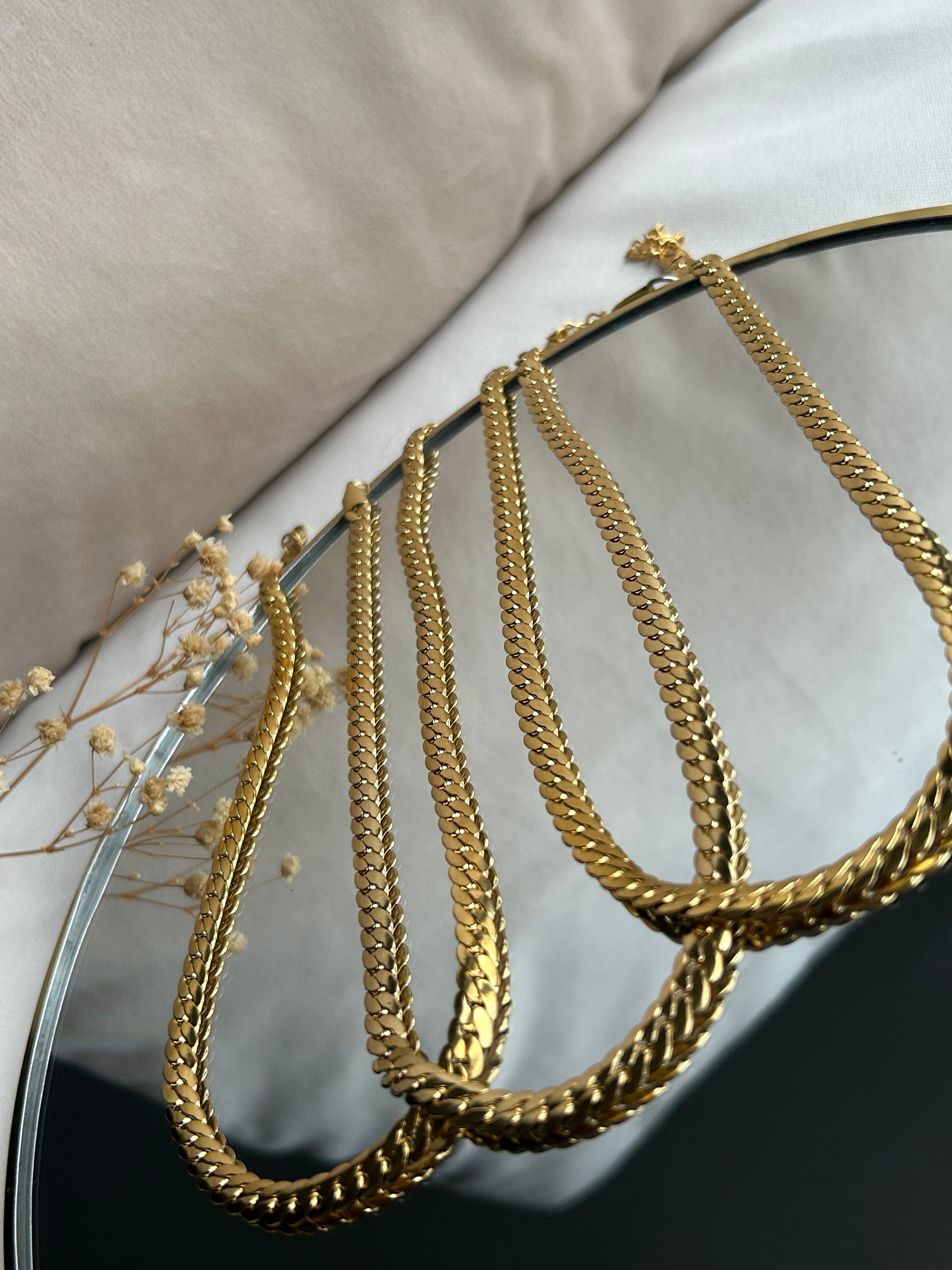 Platte schakel ketting goud